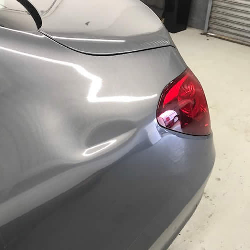 Deep dent on Mercedes C-Class Quarter Panel - Before Deep dent on Mercedes C-Class Quarter Panel - Before