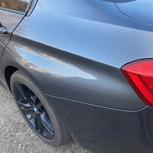 Deep dent on BMW 5 Series Quater Panel - After Deep dent on BMW 5 Series Quater Panel - After