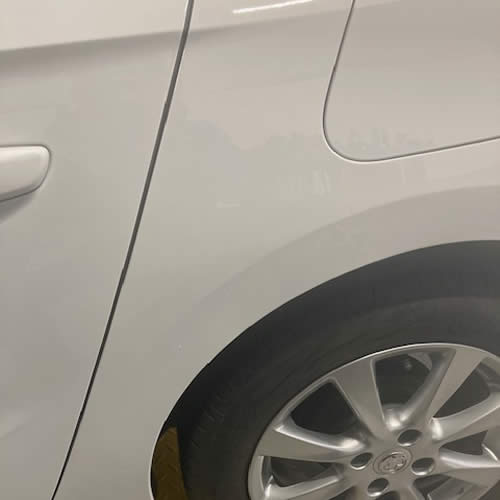 Deep dent on Vauxhall Corsa Quater Panel - After