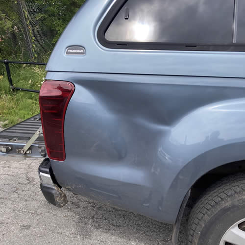 Deep dent on Isuzu Trooper Quarter Panel - Before Deep dent on Isuzu Trooper Quarter Panel - Before