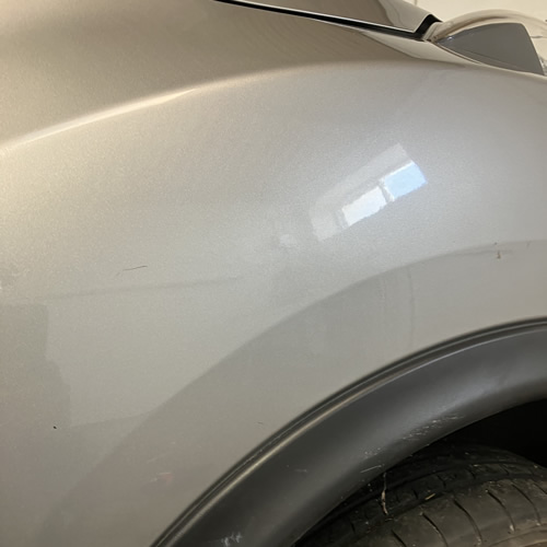 Car panel after PDR - Nissan Juke Wing Dents Car panel after PDR - Nissan Juke Wing Dents